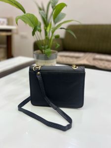 Chic Black Crossbody Bag with Chain Detail