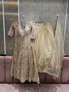 Amazing golden Peplum long Front Cut Lehga
