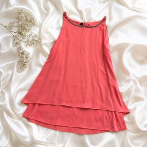 Chic Coral Layered Top with Embellished Neckline