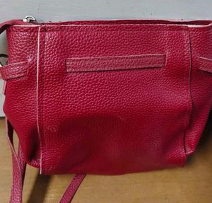 Red sling purse