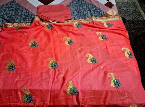 Coral Saree with golden blouse piece