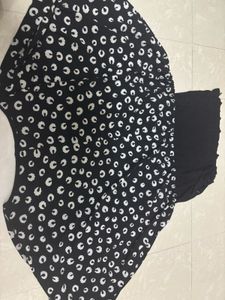 Black &amp; White Patterned Peplum Top with Solid