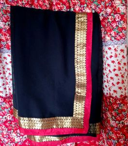 Elegant Black Saree with Gold &amp; Pink Border
