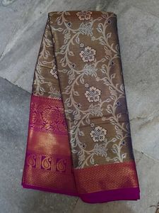Elegant Floral Saree with Pink Border