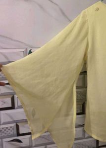 shiny sheer yellow  top