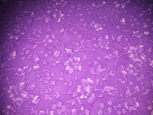 purple flower printed saree with beautiful munthan