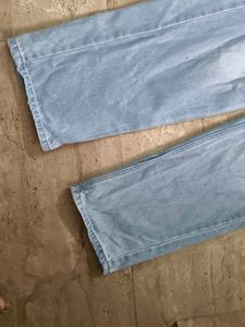 Light Wash Ripped Jeans (never worn)
