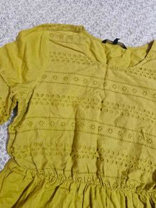 Yellow Eyelet Peplum Top