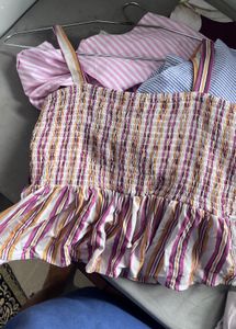 Smocked Striped Peplum Top