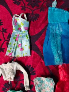 new and old Barbie dolls cloth lot