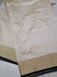 Elegant off white colour saree with blouse