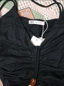 Sleek Black Ruched Mini Dress