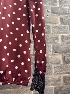 Chic Polka Dot Blouse with Lace Cuffs