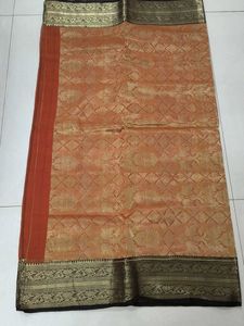 Elegant Orange Silk Saree with Gold Zari