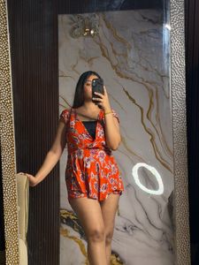 Chic Orange Floral Romper