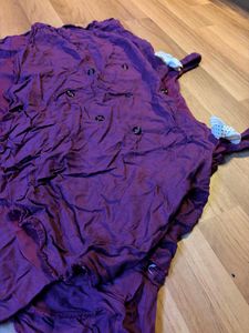 Purple Ruffled Camisole Top with cute bows on it