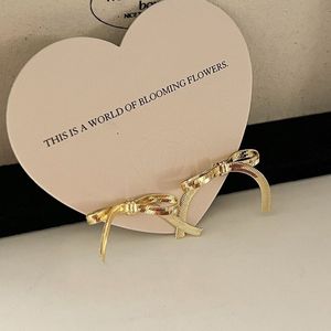 Elegant Gold Bow Earrings