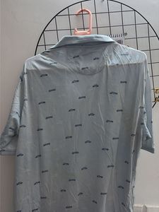 Light Blue Polo Shirt with Car Print