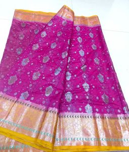 Vibrant Pink Saree with Silver Motifs