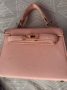 Chic Pink Textured Handbag