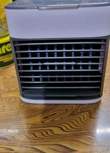 Mini portable USB powered Ac