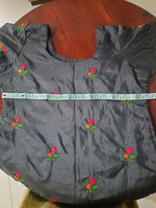 Embroidered black churidhar top