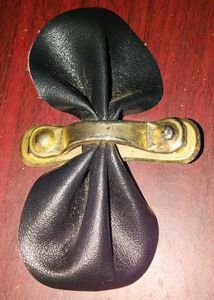 Black Faux Leather &amp; Golden Bow .