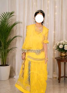Embroidered Yellow Rajasthani poshak.