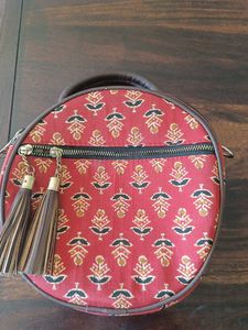 Round Sling Bag with Tassels