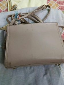 Chic Taupe Textured Handbag with Scarf Accent