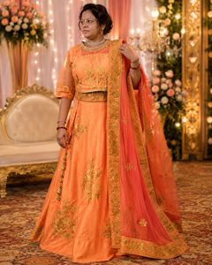 Stunning Orange Embroidered Lehenga Choli