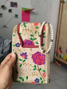 Embroidered Clutch with Pearl Handle