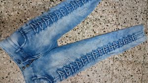 Stylish Blue Denim Jeans with Lace-Up Detail