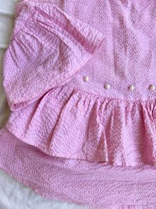 Chic Pink Peplum Top with Pearl Embellishments