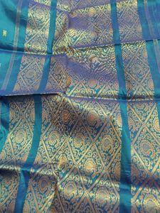 Elegant Teal Saree with Gold Border