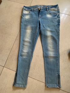 Light Wash Skinny Jeans with Zippers