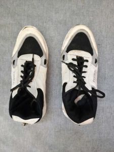 Stylish White and Black Sneakers