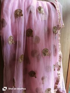 Pink net saree with sequin zari motifs