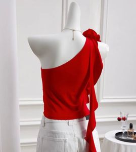 Chic Red One-Shoulder Top with Flower Accent