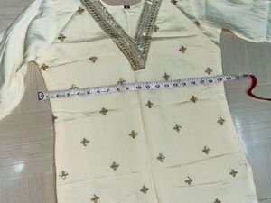 Embroidered Cream Silk Straight Kurta Pant Set.