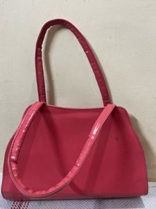 Red Handbag with Embellishments