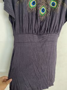 partywear dress with elegant peacock embroidery