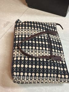 Chic Brown Handbag with Unique Pattern