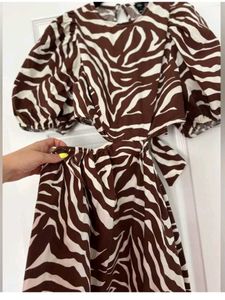Trendy Zebra Print Cut-Out Mini Dress