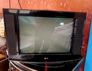 IT IS A LG TELIVISION WITH REMOTE.....