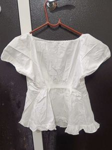 Chic White Peplum Top with Puff Sleeves