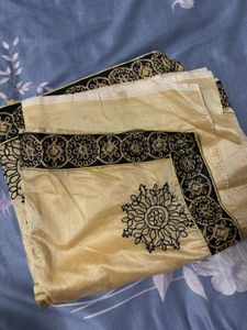 Golden Saree with Black Embroidery
