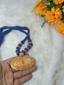 Blue Thread Necklace with Oval Pendant