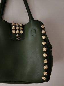 Dark green leather handbag with 3 compartments