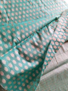Beautiful Teal dress material with woven silk work